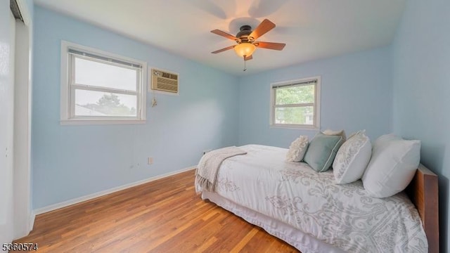813 Riverbend Dr, Clark Twp, NJ 07066 - bedroom with wood finished floors, baseboards, and a ceiling fan