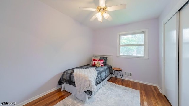 813 Riverbend Dr, Clark Twp, NJ 07066 - bedroom featuring wood finished floors, baseboards, a closet, and a ceiling fan
