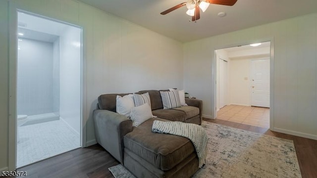 813 Riverbend Dr, Clark Twp, NJ 07066 - living area featuring a ceiling fan, wood finished floors, and baseboards