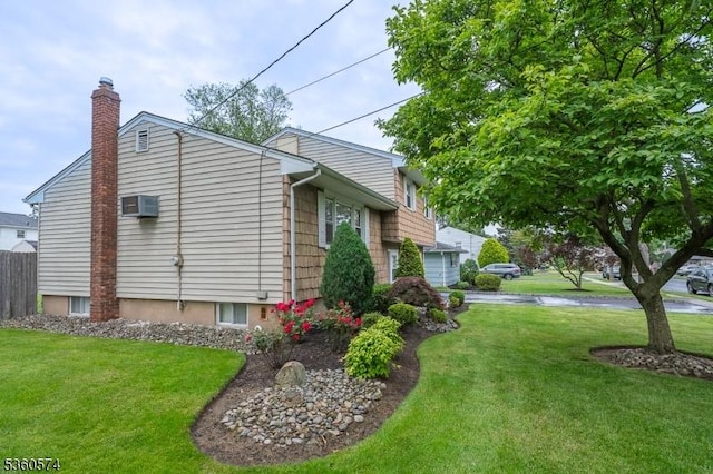 813 Riverbend Dr, Clark Twp, NJ 07066 - view of home's exterior featuring a yard and a chimney