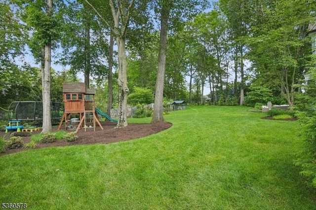 5 Barry Ln, Millburn Twp, NJ 07078 - view of green lawn with a playground