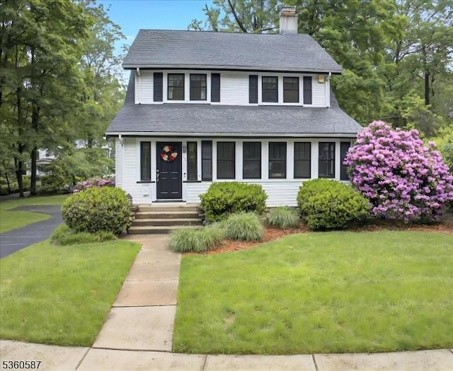 246 Park Ave, Allendale Boro, NJ 07401 - view of front of property featuring a chimney, a front lawn, and roof with shingles