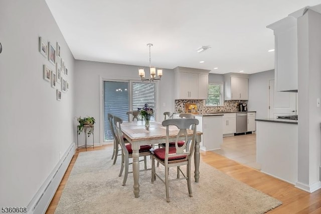 11 Anne St, Hillsborough Twp, NJ 08844 - dining room featuring a baseboard heating unit, light wood finished floors, a chandelier, recessed lighting, and baseboards
