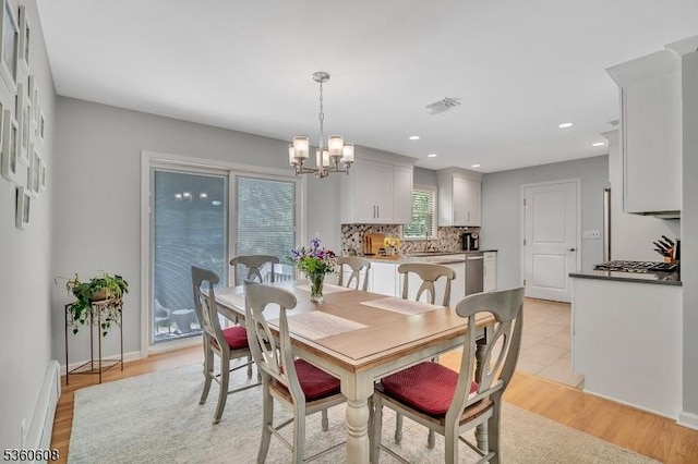 11 Anne St, Hillsborough Twp, NJ 08844 - dining space with baseboard heating, a chandelier, recessed lighting, light wood-style floors, and baseboards
