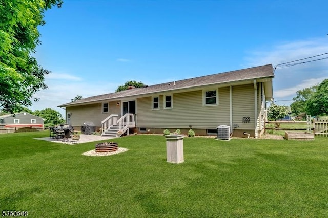11 Anne St, Hillsborough Twp, NJ 08844 - rear view of property with an outdoor fire pit, a patio area, and central AC unit