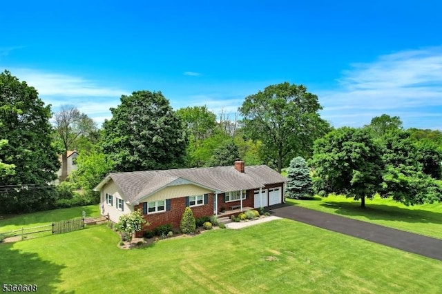 11 Anne St, Hillsborough Twp, NJ 08844 - single story home featuring a garage, driveway, a chimney, and view of wooded area