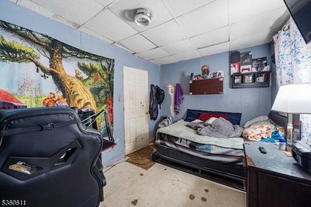 159 2nd St, Elizabeth City, NJ 07206 - bedroom with a drop ceiling and concrete flooring