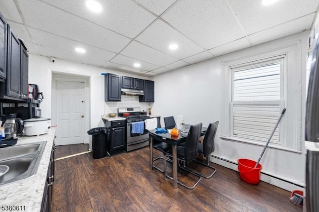 159 2nd St, Elizabeth City, NJ 07206 - dining space with dark wood-style flooring, a drop ceiling, baseboard heating, and recessed lighting