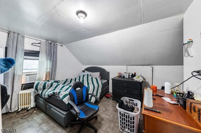 159 2nd St, Elizabeth City, NJ 07206 - bedroom featuring radiator heating unit, lofted ceiling, and cooling unit