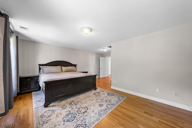 143 Oak St, Bridgewater Twp, NJ 08807 - bedroom with wood finished floors and baseboards
