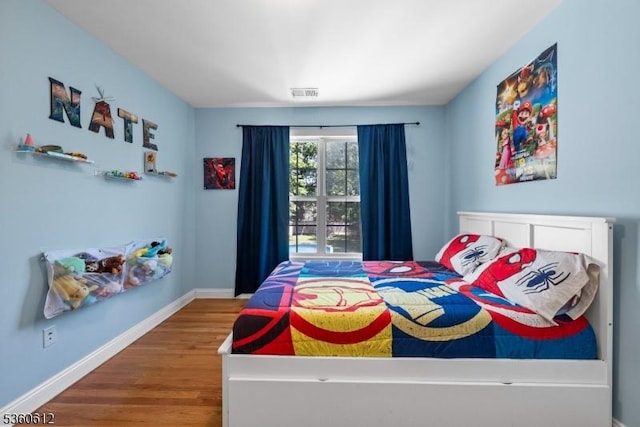 143 Oak St, Bridgewater Twp, NJ 08807 - bedroom with wood finished floors and baseboards