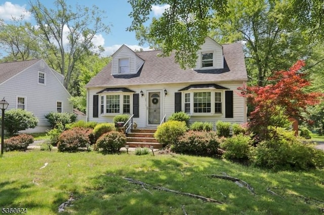 29 Union Ave, New Providence Boro, NJ 07974 - cape cod-style house featuring a front yard and roof with shingles