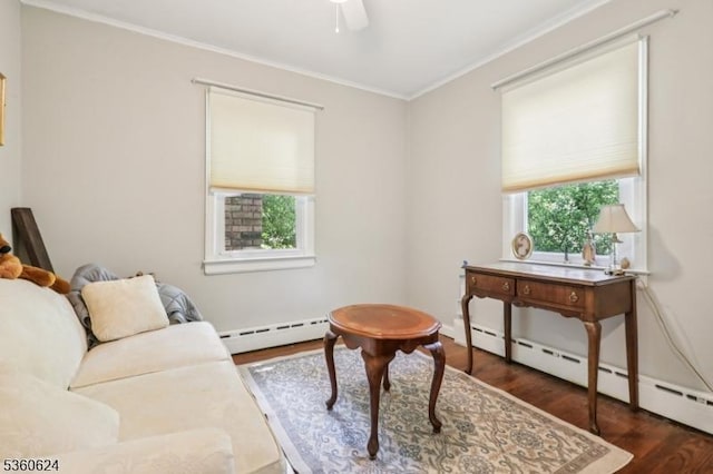 29 Union Ave, New Providence Boro, NJ 07974 - living room featuring a baseboard heating unit, ornamental molding, wood finished floors, and plenty of natural light