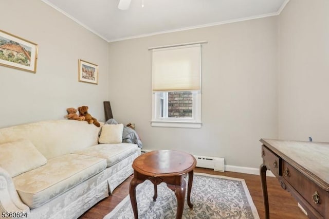 29 Union Ave, New Providence Boro, NJ 07974 - living area with a baseboard radiator, dark wood-style floors, crown molding, and ceiling fan