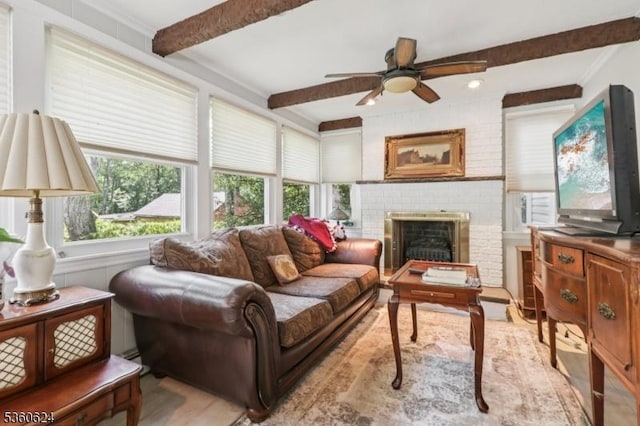 29 Union Ave, New Providence Boro, NJ 07974 - living room featuring healthy amount of natural light, ceiling fan, beamed ceiling, wood finished floors, and a brick fireplace