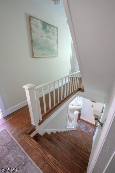 51 E Main St, High Bridge Boro, NJ 08829 - stairs featuring wood finished floors and baseboards