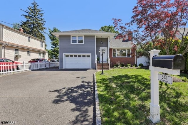 541 Westfield Rd, Scotch Plains Twp, NJ 07076 - split level home featuring driveway, a garage, and a chimney