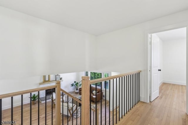 541 Westfield Rd, Scotch Plains Twp, NJ 07076 - hall featuring wood finished floors, baseboards, and an upstairs landing