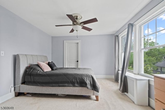 126 Beech St, Nutley Twp, NJ 07110 - bedroom featuring baseboards, light carpet, and ceiling fan