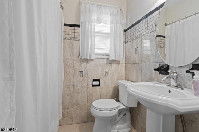 126 Beech St, Nutley Twp, NJ 07110 - full bathroom featuring tile walls, toilet, tile patterned floors, a shower with curtain, and a sink