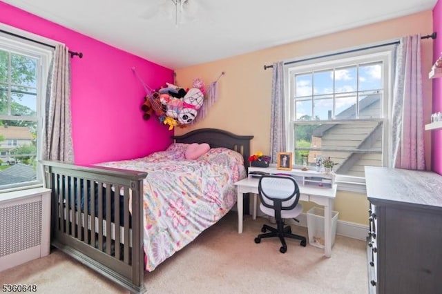 126 Beech St, Nutley Twp, NJ 07110 - carpeted bedroom with multiple windows and radiator