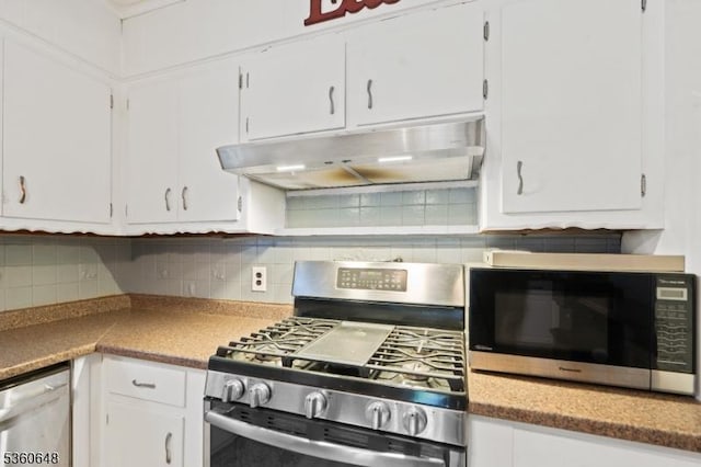 126 Beech St, Nutley Twp, NJ 07110 - kitchen with stainless steel range with gas stovetop, black microwave, under cabinet range hood, and white cabinetry