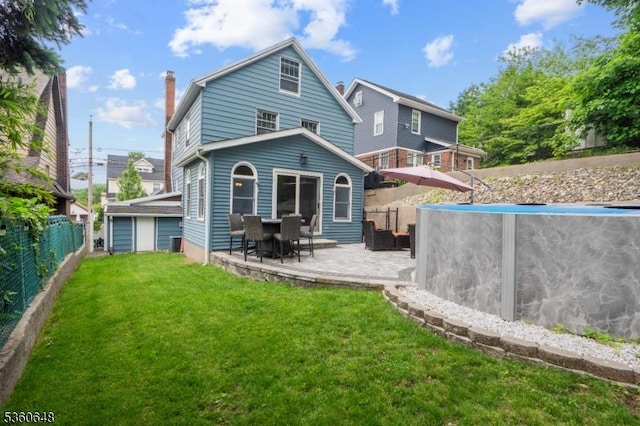 126 Beech St, Nutley Twp, NJ 07110 - back of property featuring a patio and a chimney