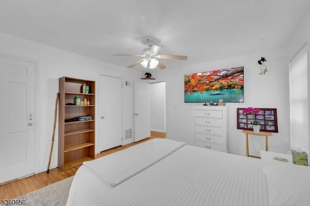 323 Gill Ln Unit Q, Woodbridge Twp, NJ 08830 - bedroom featuring wood finished floors and ceiling fan