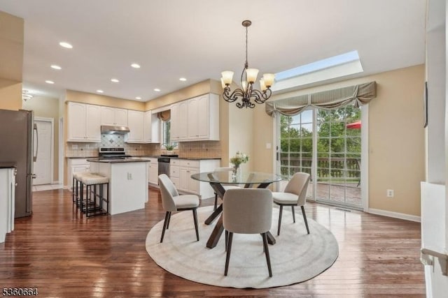 9 Labaw Way, Montgomery Twp, NJ 08502 - dining room with a chandelier, dark wood-type flooring, baseboards, a skylight, and recessed lighting
