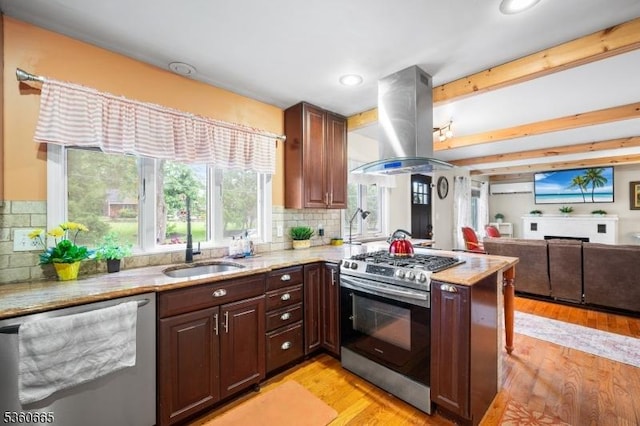 126 Smith Rd, Franklin Twp, NJ 08873 - kitchen with appliances with stainless steel finishes, island range hood, a sink, decorative backsplash, and open floor plan