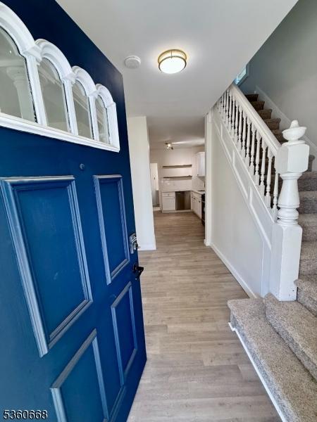 67 Mead St, Newark City, NJ 07106 - entrance foyer with stairway and wood finished floors