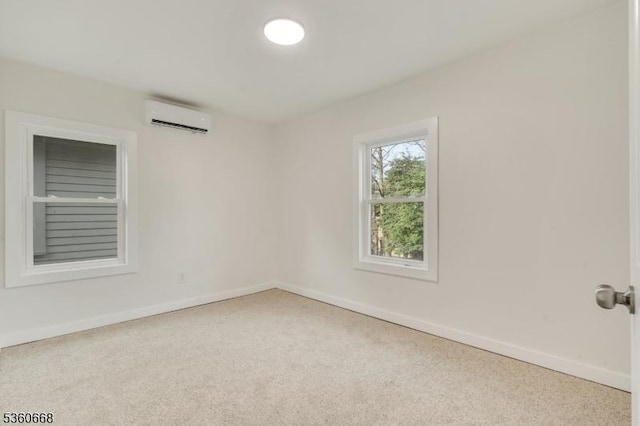 67 Mead St, Newark City, NJ 07106 - carpeted empty room featuring a wall mounted air conditioner and baseboards