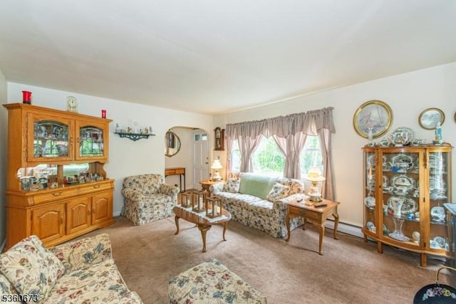 291 Germantown Rd, West Milford Twp, NJ 07480 - living room featuring carpet flooring, arched walkways, and baseboard heating