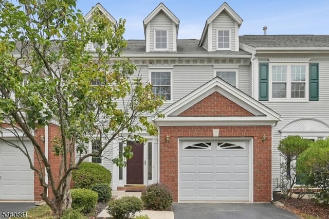 1503 Bayley Ct, Bridgewater Twp, NJ 08807 - multi unit property featuring an attached garage, brick siding, and driveway