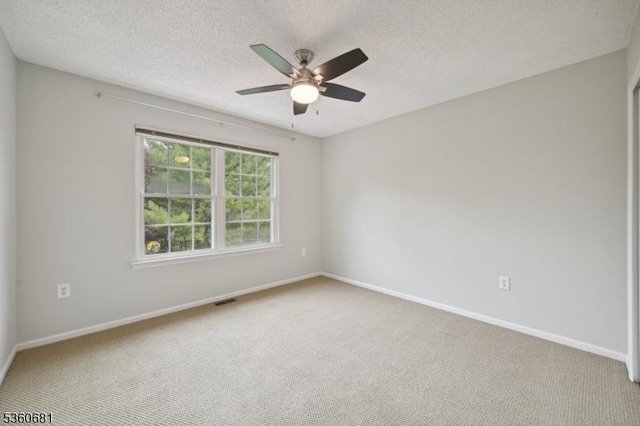 1503 Bayley Ct, Bridgewater Twp, NJ 08807 - empty room featuring a ceiling fan, carpet, baseboards, and a textured ceiling