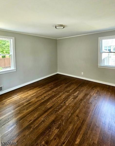 36 Webster Ave, Summit City, NJ 07901 - unfurnished room with crown molding, dark wood-type flooring, and baseboards