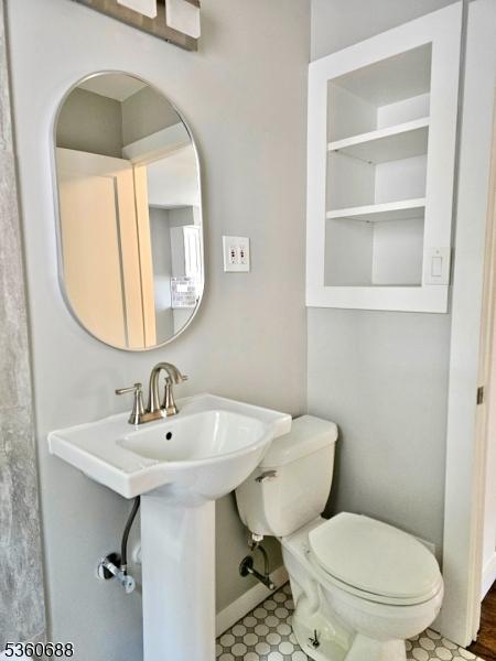 36 Webster Ave, Summit City, NJ 07901 - bathroom featuring toilet, baseboards, and a sink