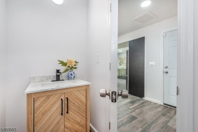 35 Ellis Ave, Irvington Twp, NJ 07111 - bathroom with vanity and wood finished floors