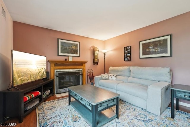 7 Michael Ct, Green Twp, NJ 07860 - living area with wood finished floors and a glass covered fireplace