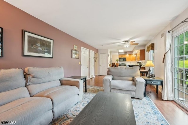 7 Michael Ct, Green Twp, NJ 07860 - living area featuring light wood-style flooring and ceiling fan