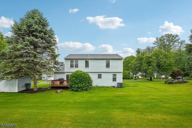 7 Michael Ct, Green Twp, NJ 07860 - back of property with a deck, a lawn, and central AC