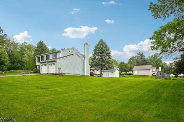 7 Michael Ct, Green Twp, NJ 07860 - view of grassy yard with driveway and a garage