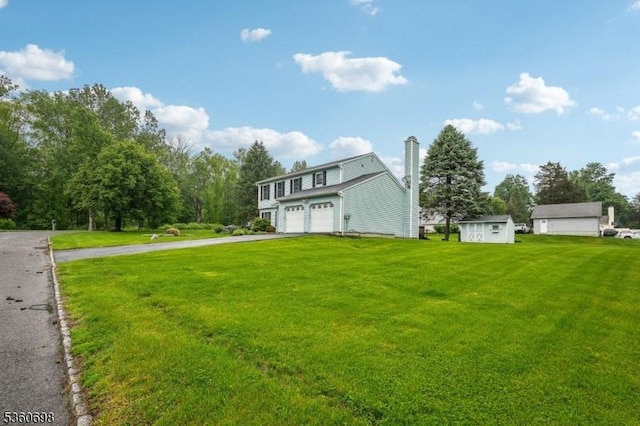 7 Michael Ct, Green Twp, NJ 07860 - traditional-style house featuring asphalt driveway, a front yard, a garage, and a chimney