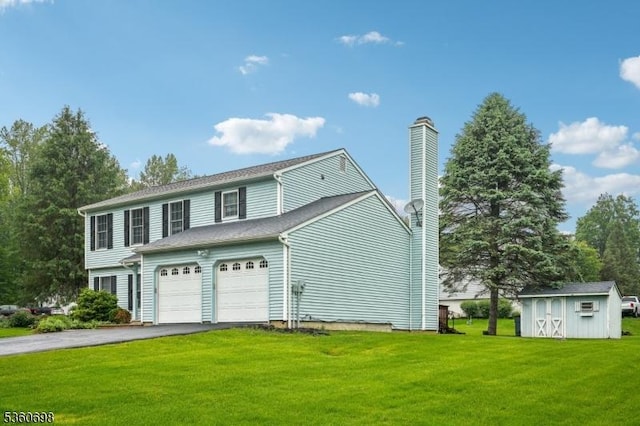 7 Michael Ct, Green Twp, NJ 07860 - view of side of home featuring driveway, a chimney, a yard, and a garage