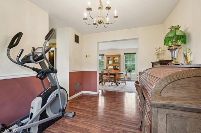 7 Michael Ct, Green Twp, NJ 07860 - workout area with wood finished floors, a chandelier, and baseboards
