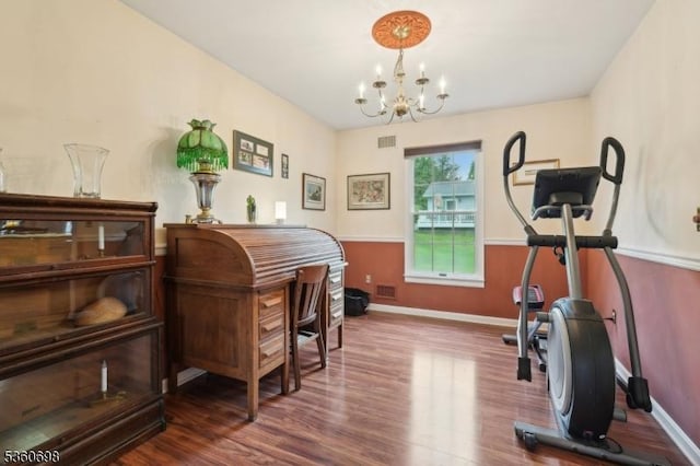 7 Michael Ct, Green Twp, NJ 07860 - workout room featuring wood finished floors, a chandelier, and baseboards