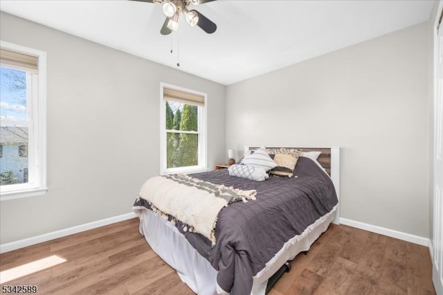 424 Willow Ct, Raritan Twp, NJ 08822 - bedroom featuring baseboards, light wood-style floors, and a ceiling fan