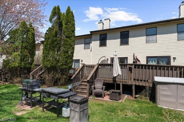 424 Willow Ct, Raritan Twp, NJ 08822 - rear view of property with a chimney, stairway, a wooden deck, and a lawn