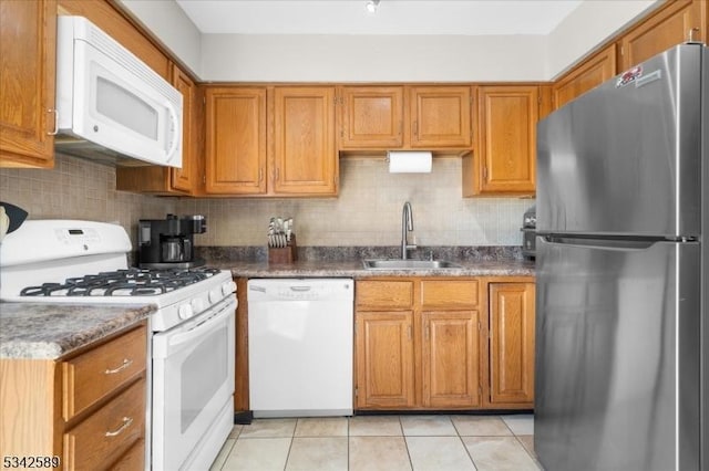 424 Willow Ct, Raritan Twp, NJ 08822 - kitchen featuring white appliances, a sink, and brown cabinets
