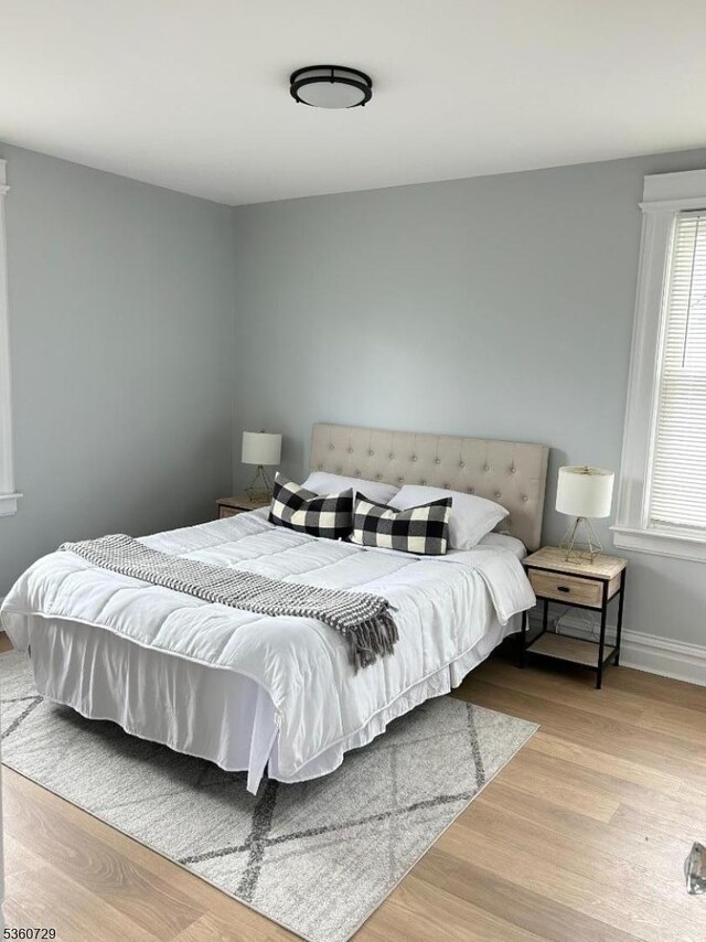 96 Franklin Ave, Maplewood Twp, NJ 07040 - bedroom featuring wood finished floors and baseboards